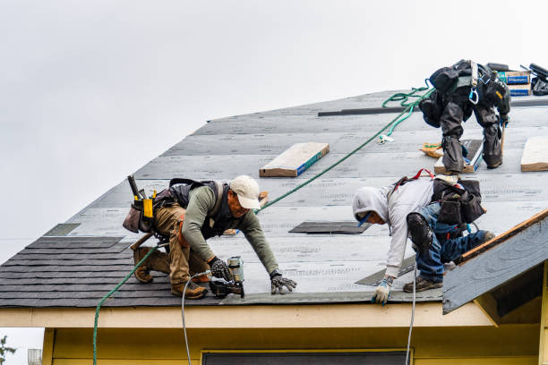 Professional Roofing technician working in Riverbank, CA